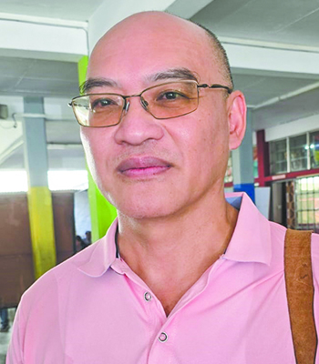 Aaron Kwang Poon, un candidat du parti Repiblik Sitwayen Popiler au Ward 4.